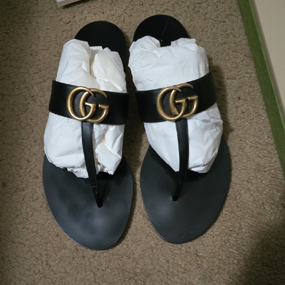 Gucci Black and Gold Sandals with Iconic GG Logo